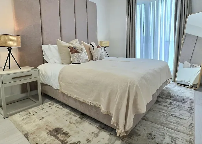 Experience Luxury In This Stunning Three-Bedroom Modern Townhouse Frontline To The San Roque Golf